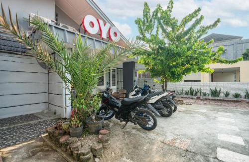 Padang Hotel | SUPER OYO Gandaria Guest House Near Masjid Raya Sumatera Barat