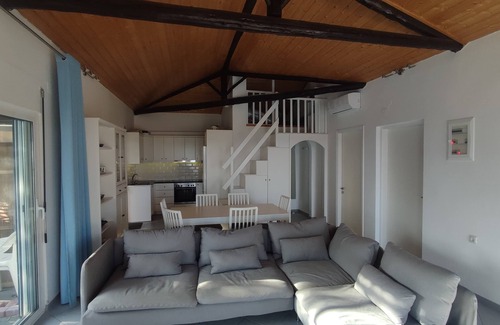 Marathokampos Villa | Superb coastal villa. Sleeps 6. Large private patios. Beaches few minutes walk.
