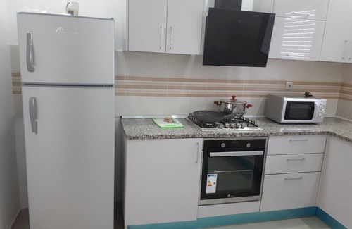 Bouficha Apartment | Superb modern app., richly furnished, pool view, lawned mountain garden