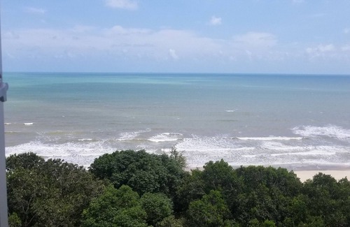 Pelindung Apartment | Sutra Damai Guesthouse near coast of Teluk Chempedak and Pelindung Hill. 1 min walk to beach