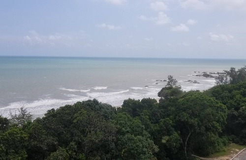 Pelindung Apartment | Sutra Damai Guesthouse near coast of Teluk Chempedak and Pelindung Hill. 1 min walk to beach