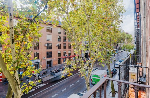 Golden Triangle of Art Apartment | Sweet Huertas Cortes 3BR w/Doorman, Balcony, A/C, by Blueground