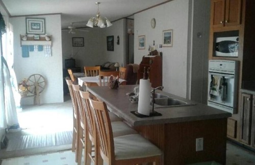 Manning House | Take a relaxing vacation in a quiet rural neighborhood-public boat dock nearby!