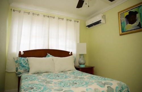 Nassau House | Tangerine Sunsets Alta Vista Suite 2