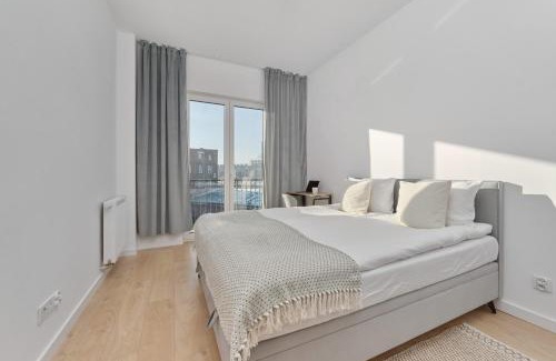 Krzyki Apartment | Tasteful Apartment with FREE GARAGE and Balcony by Noclegi Renters