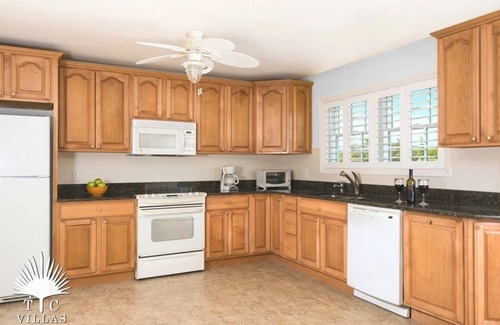 Long Bay Hills House | TC Villas -Sandy Beaches -Privacy, Activities, & Stunning Beach