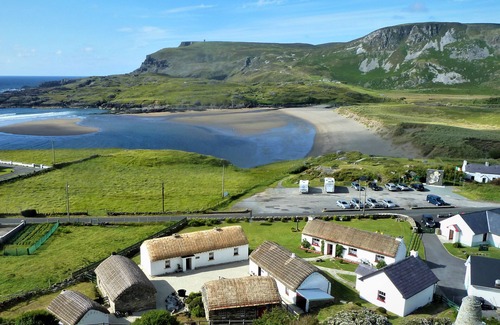 Carrick Cottage | Teach Condy's Cottage nestled at the bottom of Sliabh Liag Cliffs, Co. Donegal