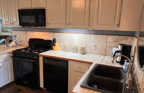 Vian House | Tenkiller Lake Beach Themed Retreat Offering a Perfect Oasis for Our Guest.