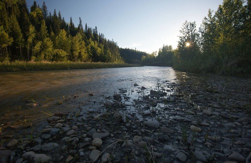 Sundre RV Rental | Tent and RV site on the James River at Stark Ranch Resort Site #1