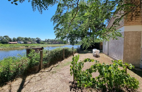 Mimizan House | Terraced house ideally located directly on the Courant riverbank.