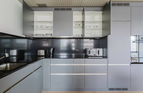 Seebach Apartment | Terrific Oerlikon 1BR w/Balcony, W/D & Elevator, by Blueground