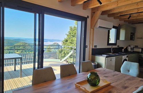 Queyrieres Ski Chalet | Testavoyre: Gîte with breathtaking views of the Haute Loire mountains.