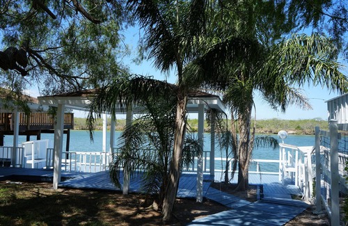 Cameron County Cottage | Texas themed cabin with a Shared fishing pier Not waterfront