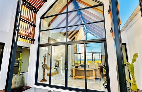 Shelley Point House | Thalassophile is a 4-bedroom house in St Helena Bay with direct Beach Access.