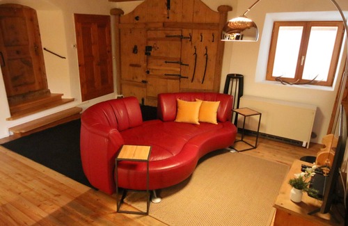 Engadin Scoul House | The 240 m2 authentic Engadine farmhouse from 1650 in the middle of i