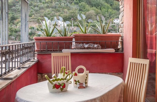 Isolabona Apartment | The attic from the fountain