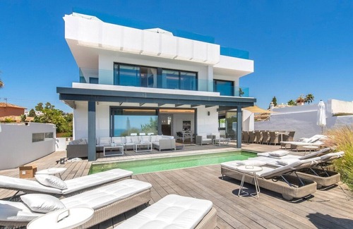Urbanizacion Costabella Villa | The Beach House -Front line beach Villa in Elviria