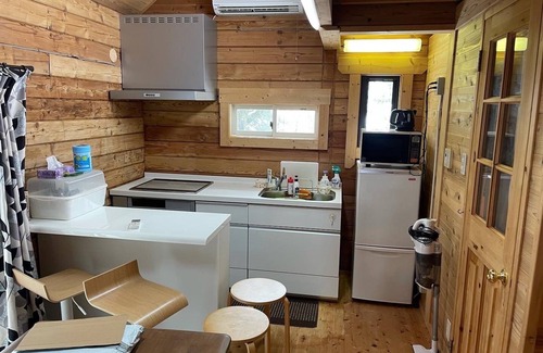 Imazu Cottage | The bedroom has 1 double bed and 2 single beds do/Takashima Shiga