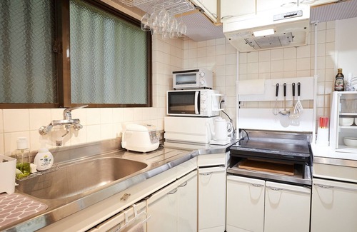 Maejima Apartment | The bedrooms are futons so you can bring your baby with you Baby chair available/Naha Okinawa