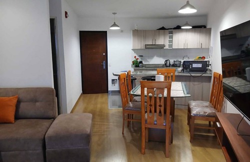 Santa Beatriz Apartment | The best view, in front of the magical circuit of the waters. includes garage.