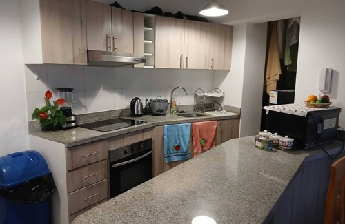 Santa Beatriz Apartment | The best view, in front of the magical circuit of the waters. includes garage.