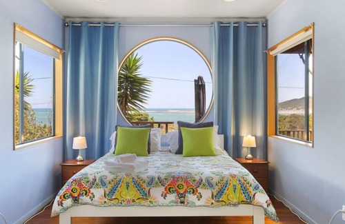 Raglan Cottage | The Big Round Window - Raglan Holiday Home