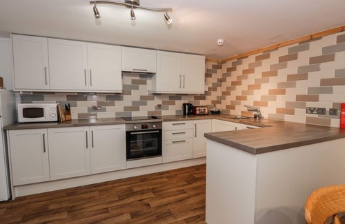 Newton Stewart Cottage | THE BYRE, pet friendly, with a garden in Newton Stewart