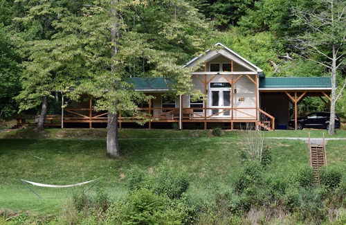 Lansing Cabin | The Cabin- Riverside Cabin Perfect For Your Family Getaway.or romantic getaway
