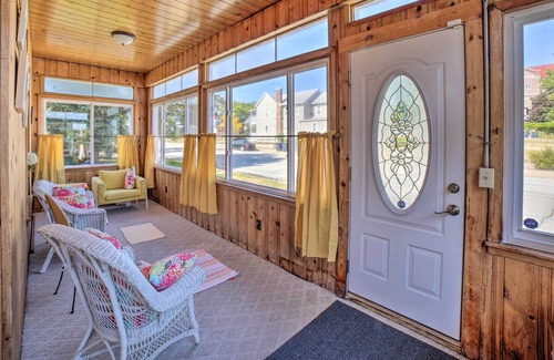 Michigan City House | 'The Cedar Porch' in Michigan City w/ Sunroom