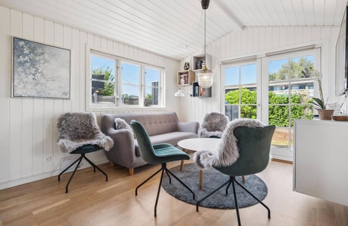 Broager House | The charming cottage offers you a fantastic view of the water.