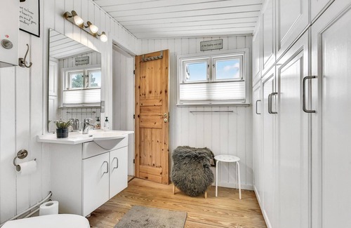 Broager House | The charming cottage offers you a fantastic view of the water.