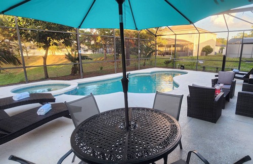 Windwood Bay House | The Citrus Splash | Family-Friendly Retreat Near Disney & Universal w/Pool, Spa & Game Room