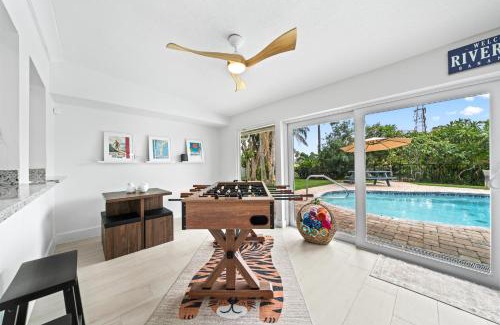 Venetian Way House | The Cocoa Plum - A Quiet Riverfront Pool Home Near Beach
