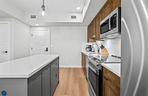 Dead Man's Flats Condo | The Creekside - Top Floor Mountiain & Creek Views