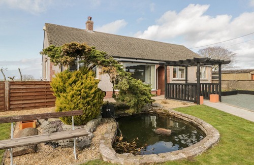 Wigton House | THE CROFT BUNGALOW, with a garden in Aspatria