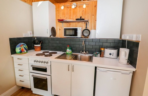 Killeagh Cottage | THE DISPENSARY, pet friendly, with a garden in Killeagh, County Cork
