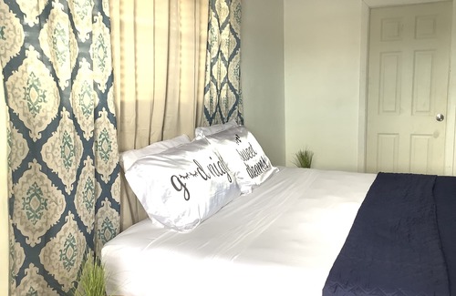 Nassau House | The Dollie Mae: Comfortable King Bed Suite