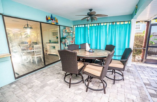 Apollo Beach House | The Flamingo- Waterfront Home with heated pool, hot tub and kayaks!