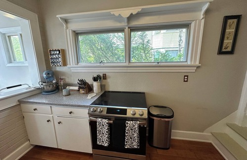 Cedar Rapids House | The Grand Rapidian- Historic 4-bedroom House with Fenced in Yard! Pet Friendly!