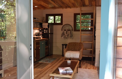 Elizabethton Cabin | The Hidden Hemlock Treehouse: Sleep cozy among the trees with a waterfall view