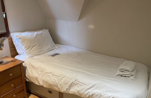 South Laggan Ski Chalet | The Highland Adventure Lodge - sleeps 6 guests in 3 bedrooms and via the sofa bed in the lounge