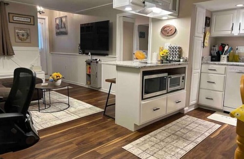 Billerica Apartment | The Hive: A Honeybee-Themed Retreat. Wi-fi, Video Games, EV Charger, Garden View