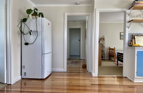 Primrose Sands Apartment | The Lazy Fig - Ocean Views, Orchard & Pizza Oven