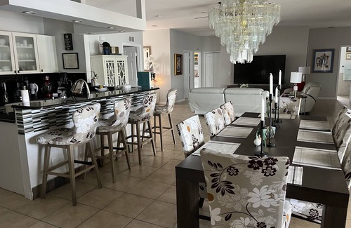 Joel House | The Little Coconut Flower. Enjoy serene Florida time with friends, and family .