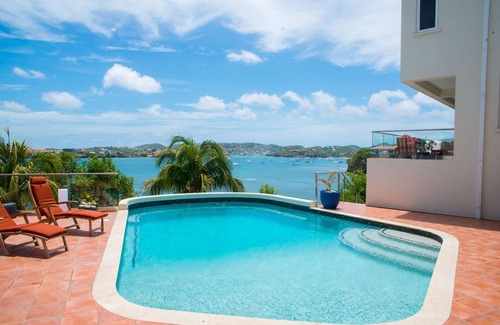 Lance aux Epines Villa | The Main Villa has three bedroom. The master bedroom, has its own patio.