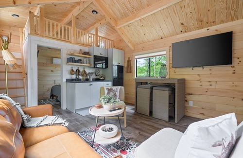 Frenchburg House | The Mighty Acorn, Bungalow is a delightful cozy tiny home in the woods.