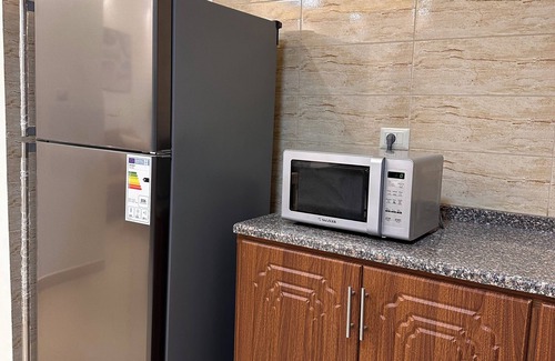 Sahab Apartment | The Mosaic HomenChic apartment in Madaba with Modern Amenities