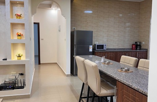 Sahab Apartment | The Mosaic HomenChic apartment in Madaba with Modern Amenities