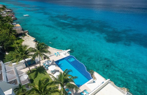Zona Hotelera Norte Condo | The most Romantic Oceanfront Penthouse condo on the island!