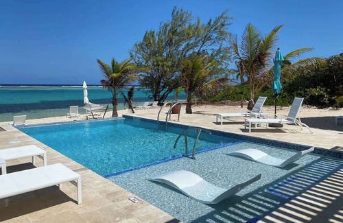 Colliers Bay Condo | The No Problem Oceanfront Studio Cottage in East End